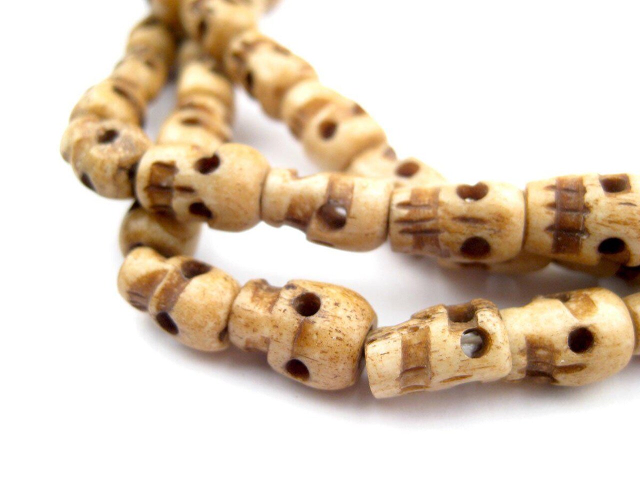 The Bead Chest Vintage-Style Carved Bone Skull Beads Long Strand 7mm Nepal Brown 46 Inch Strand